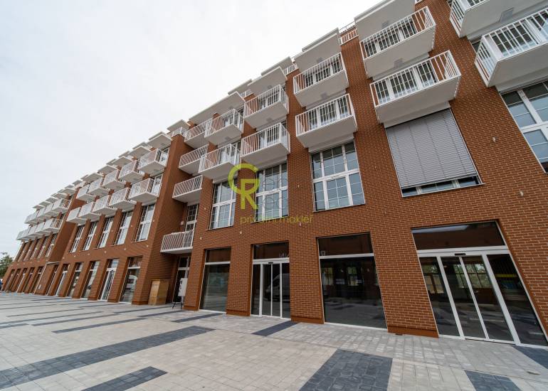 Pronájem světlého bytu 1+kk, 40,5 m², s lodžií, parkováním a sklepem – Praha–Kbely