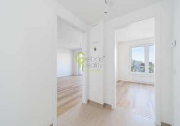 Pronájem bytu 2+kk s balkonem, garážovým stáním a sklepem – novostavba Sija Kamýk, Praha 12