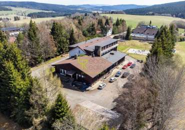 Exkluzivní investiční příležitost v srdci Šumavy-fungující hotel a současně development s povolením
